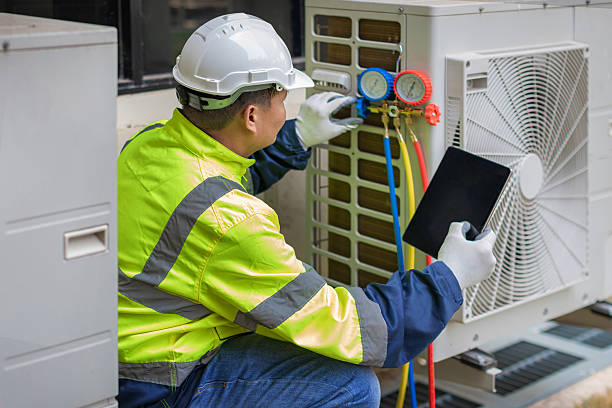 Professional Heat Pump Repair technician working in Trenton, IL